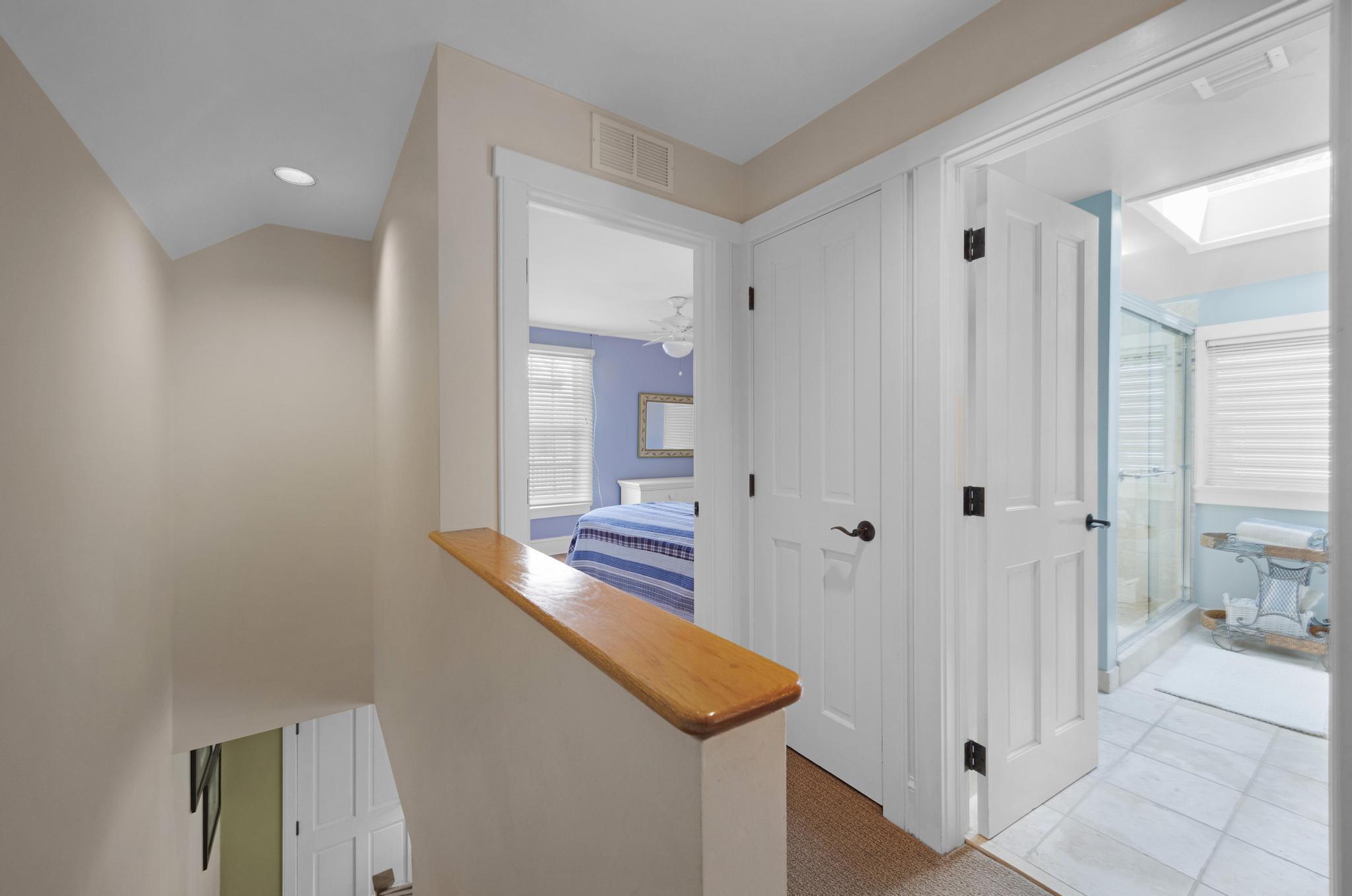 606 Truman Avenue, Unit 10 Key West, FL 33040 - Photo 12 of 20 a view of a hallway with bathroom and shower