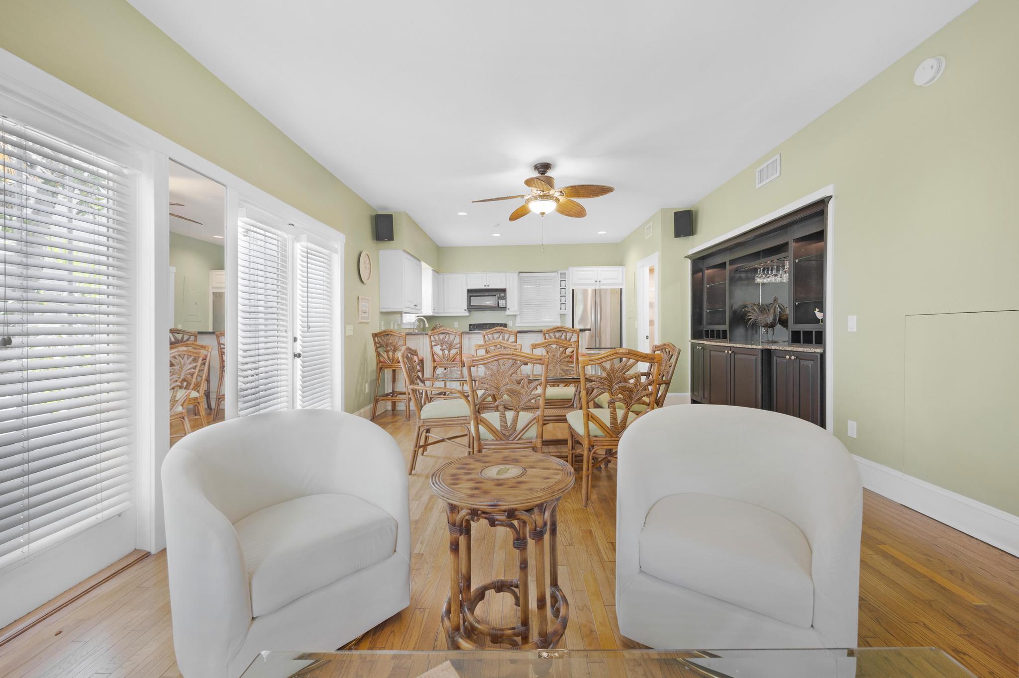 606 Truman Avenue, Unit 10 Key West, FL 33040 - Photo 5 of 20 a view of a livingroom with furniture and a window