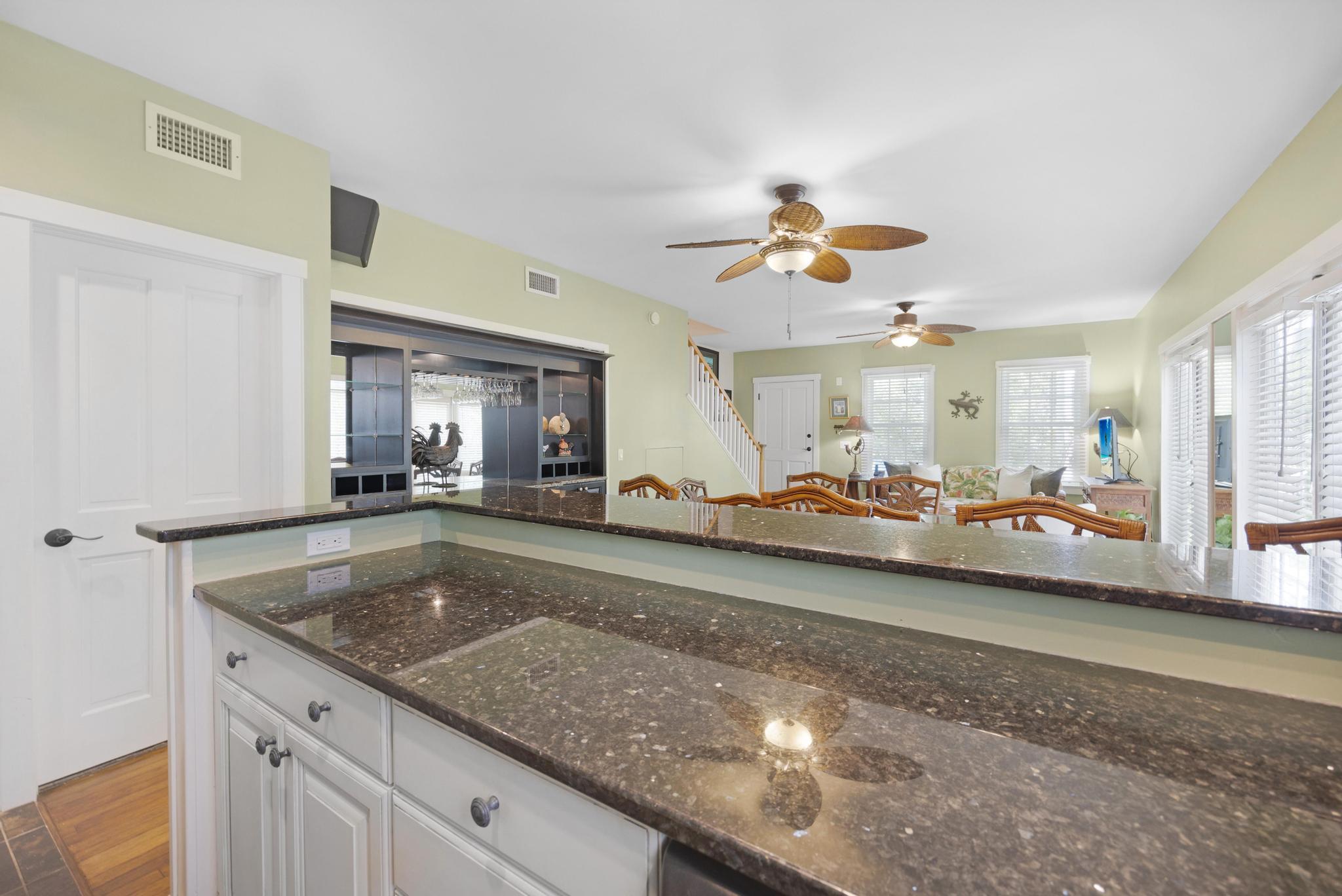 606 Truman Avenue, Unit 10 Key West, FL 33040 - Photo 9 of 20 a view of a living room and bedroom