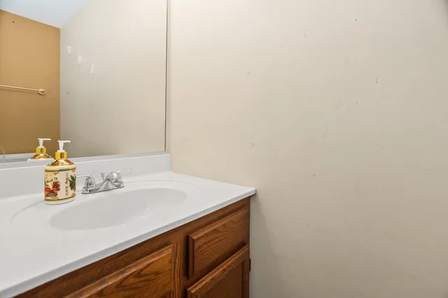 a view of a house with a tree