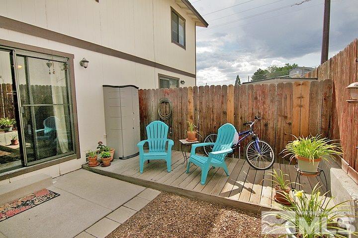 4985 West 7th Street, Unit 10 Reno, NV 89503 - Photo 20 of 20 a view of a dinning tables and chairs in patio