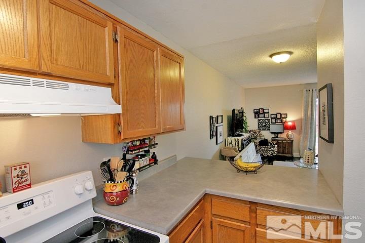 4985 West 7th Street, Unit 10 Reno, NV 89503 - Photo 4 of 20 a kitchen with a sink and cabinets