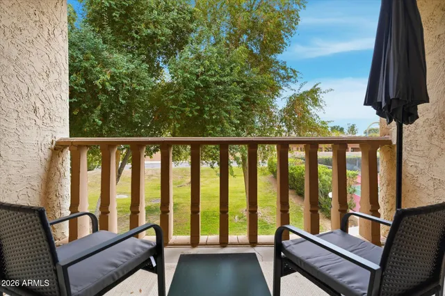 a view of a livingroom with furniture and front door