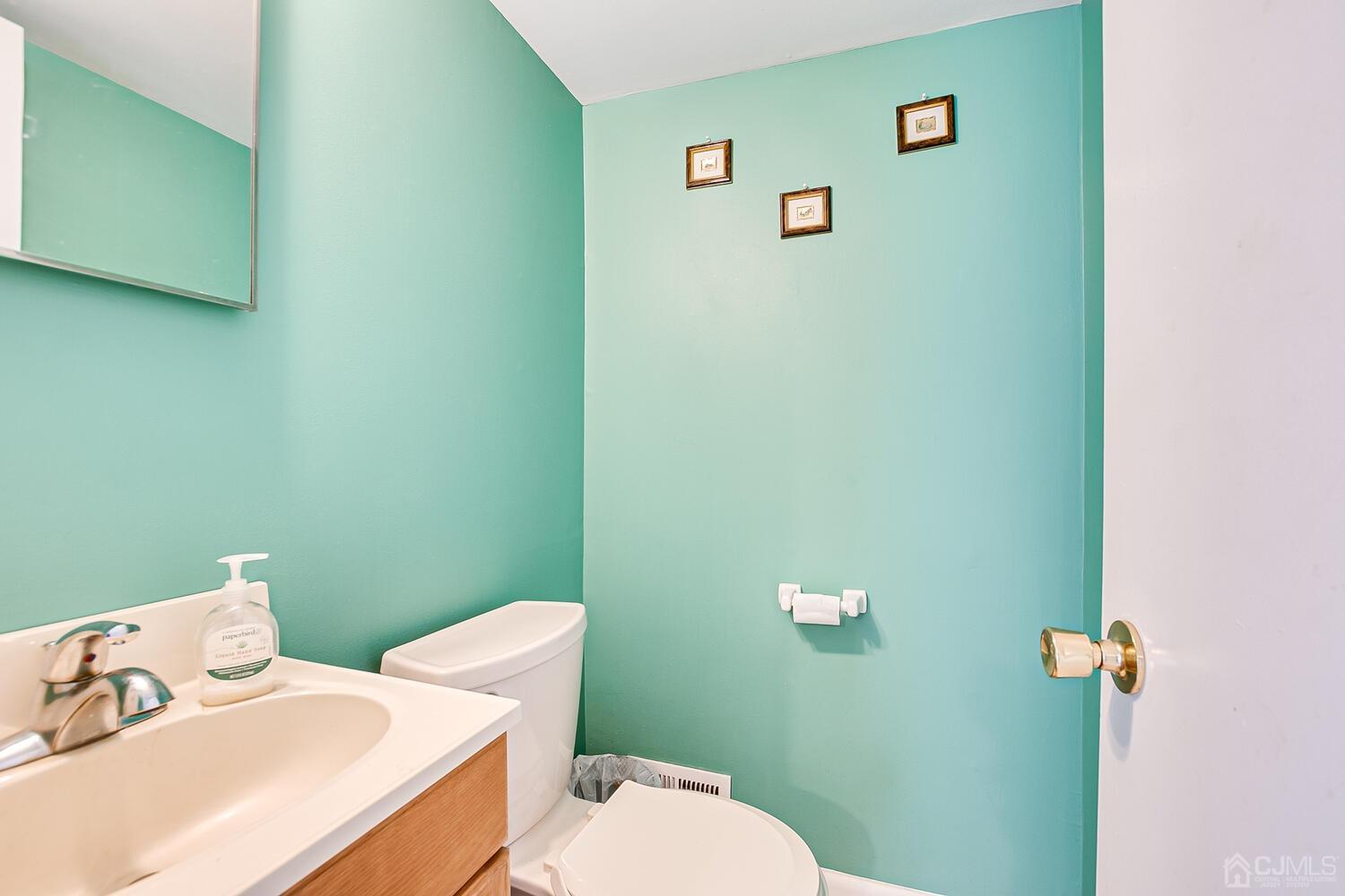 2 Julie Drive Edison, NJ 08820 - Photo 15 of 34 a bathroom with a toilet and sink