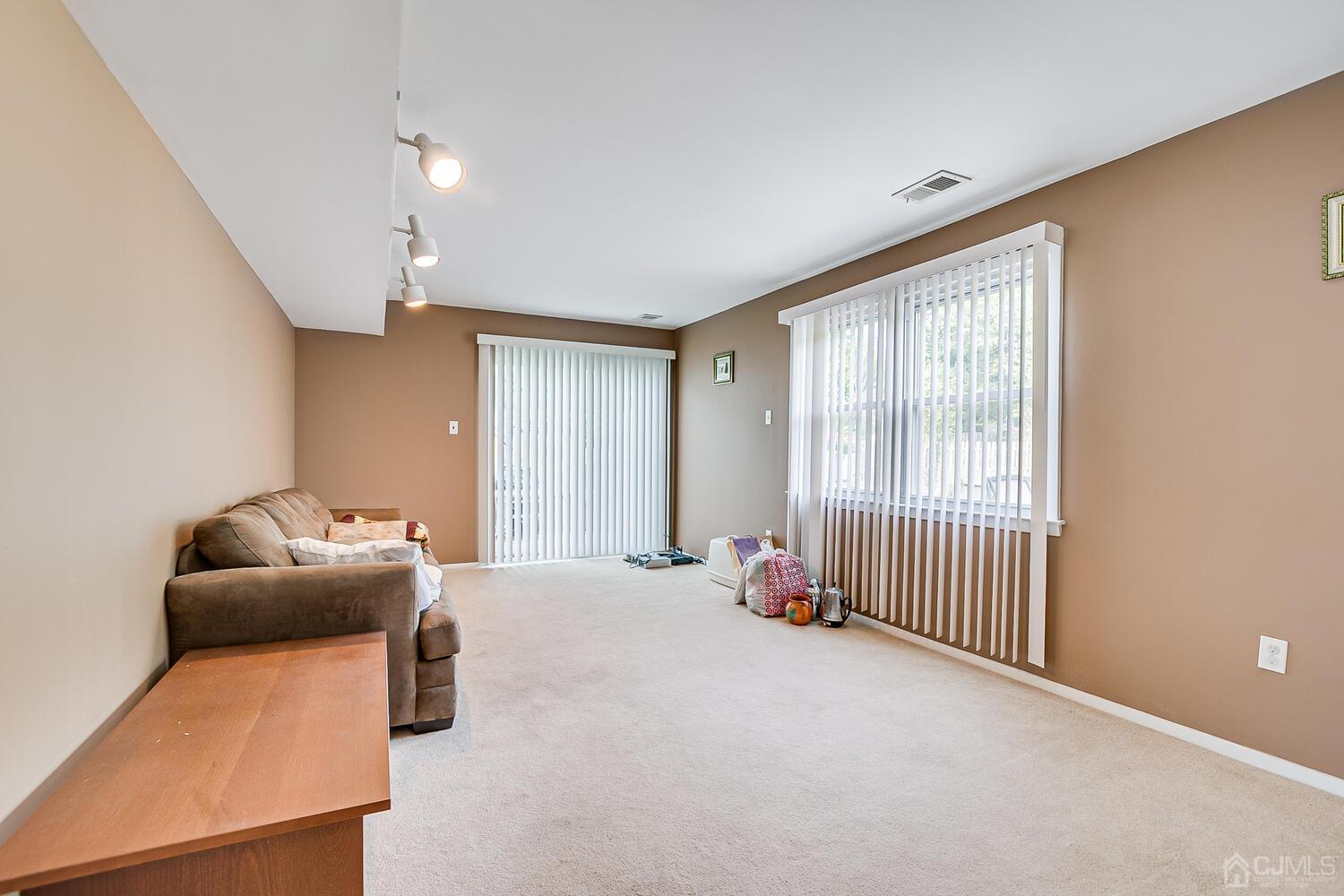 2 Julie Drive Edison, NJ 08820 - Photo 16 of 34 a room with furniture and a window