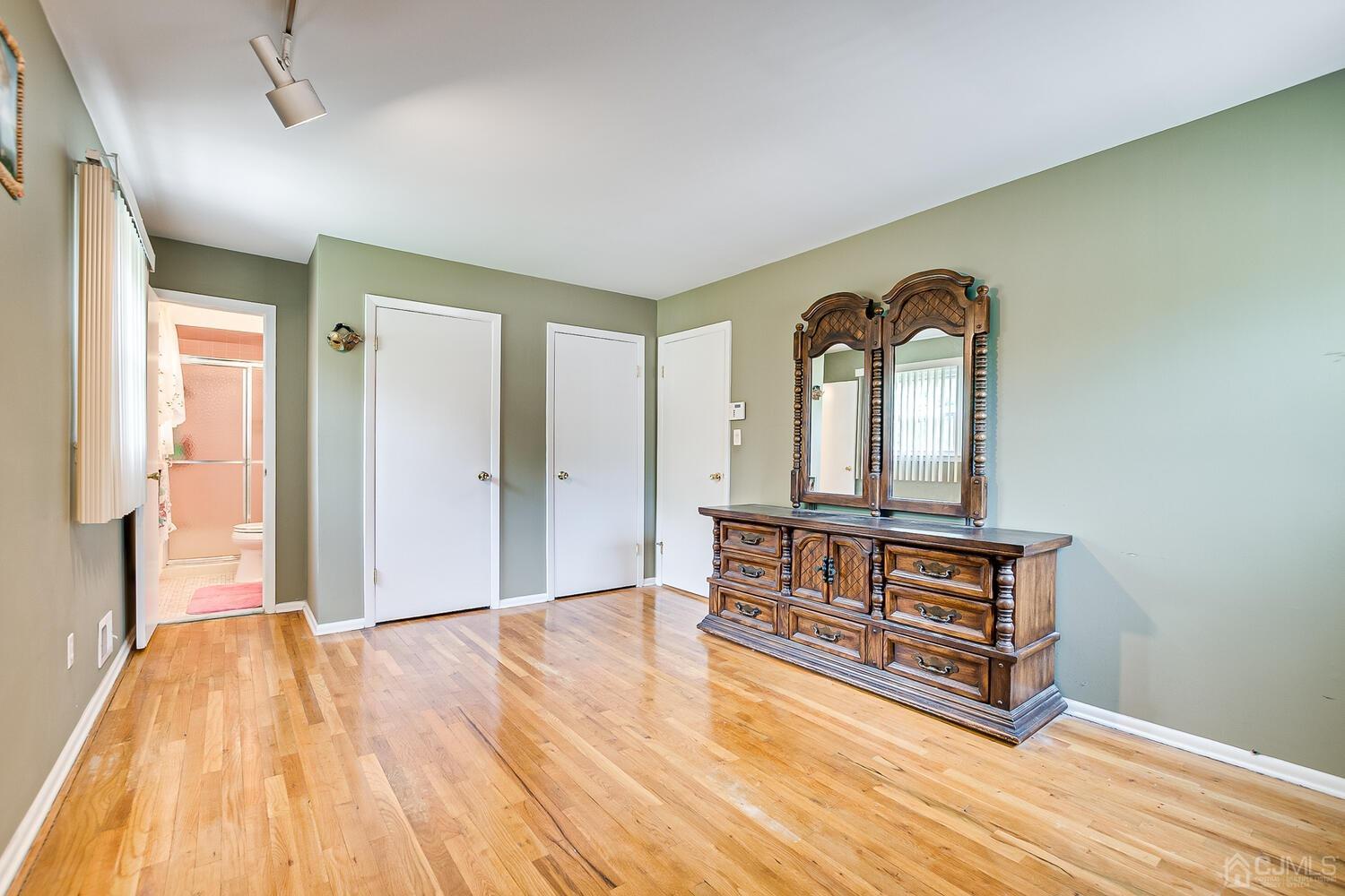 2 Julie Drive Edison, NJ 08820 - Photo 20 of 34 a view of livingroom with furniture and wooden floor