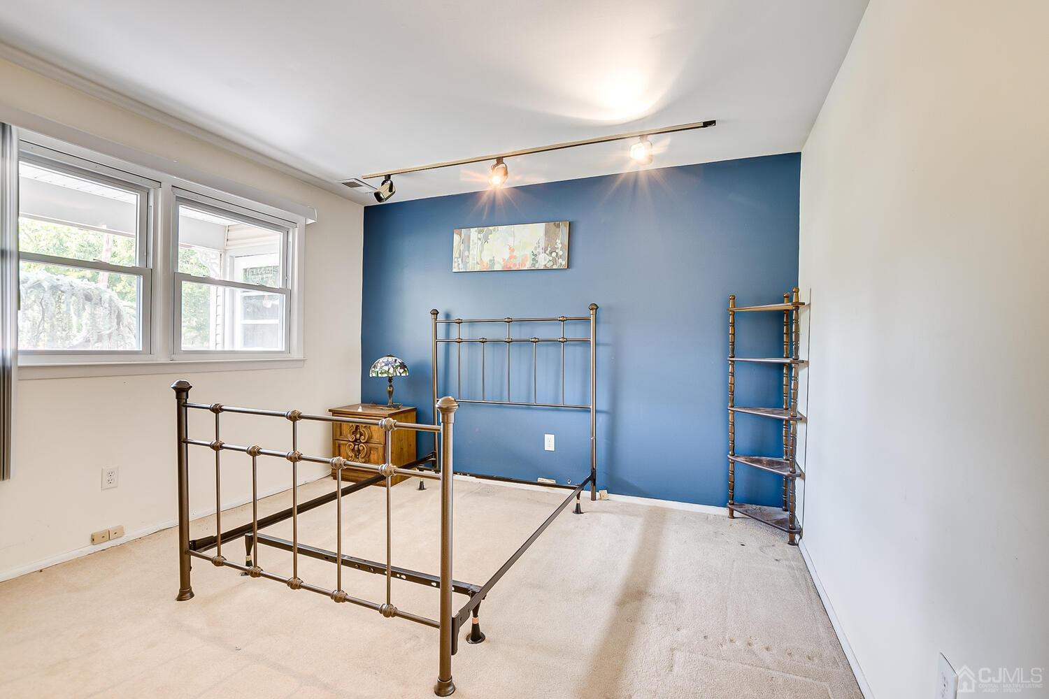 2 Julie Drive Edison, NJ 08820 - Photo 26 of 34 a view of a livingroom with furniture and windows