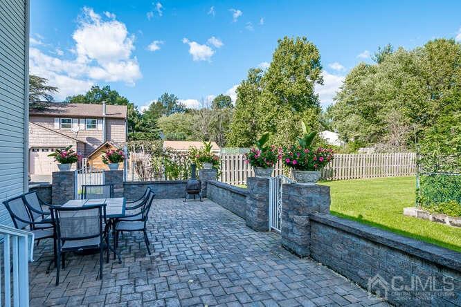 2 Julie Drive Edison, NJ 08820 - Photo 27 of 34 a view of a chairs and table in the patio