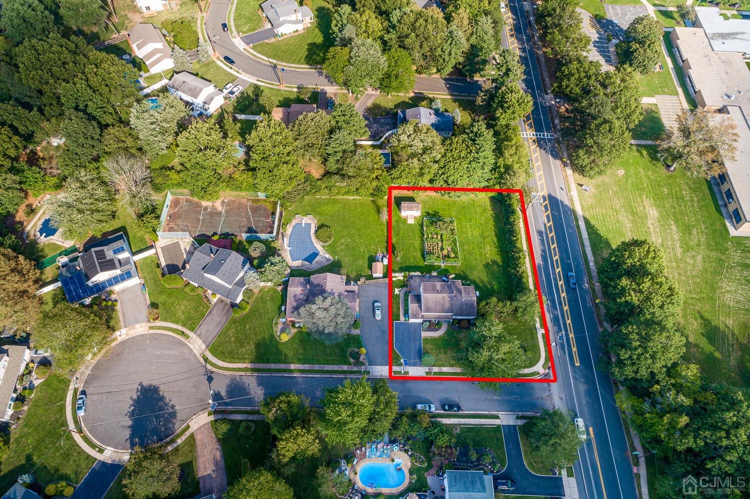 2 Julie Drive Edison, NJ 08820 - Photo 30 of 34 an aerial view of residential house with outdoor space and swimming pool