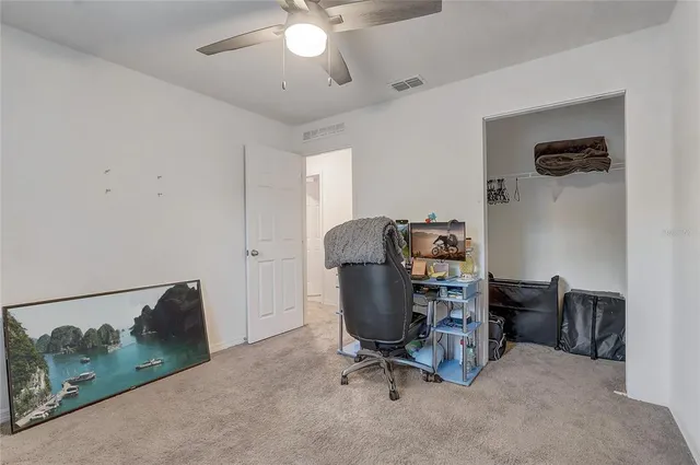 a workspace with furniture and a window