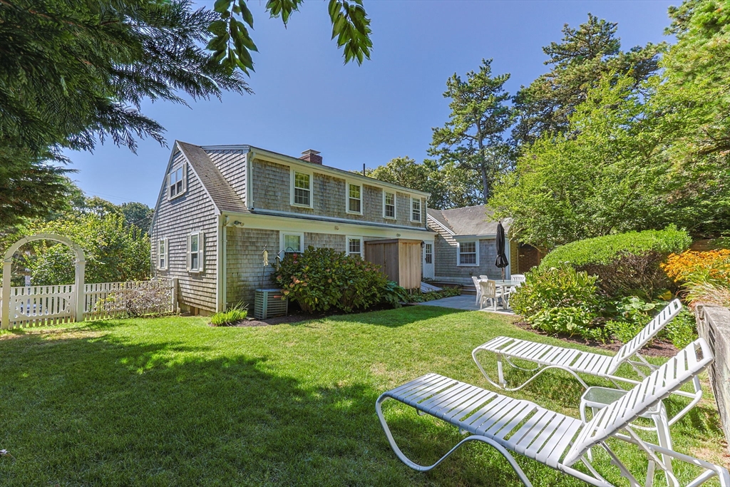 200 Hardings Beach Road Chatham, MA 02633 - Photo 24 of 24 a front view of a house with garden
