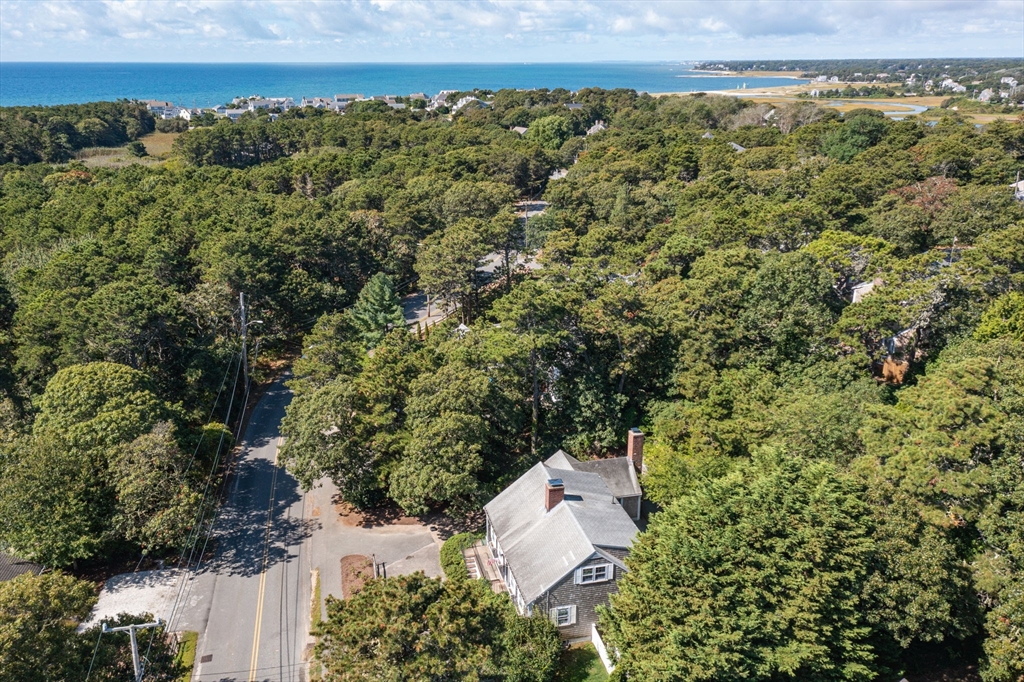 200 Hardings Beach Road Chatham, MA 02633 - Photo 4 of 24 an aerial view of a house with a yard