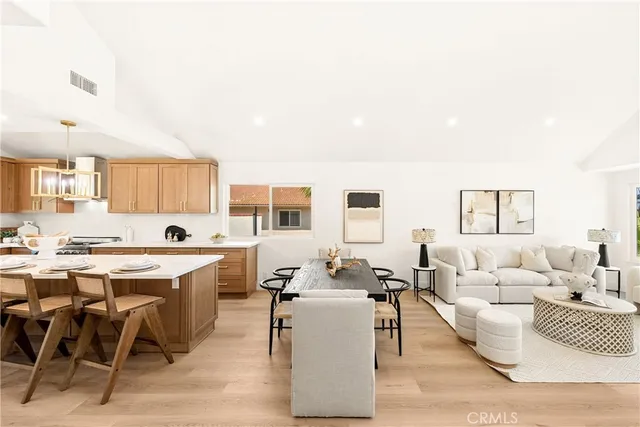 a living room with furniture and a table