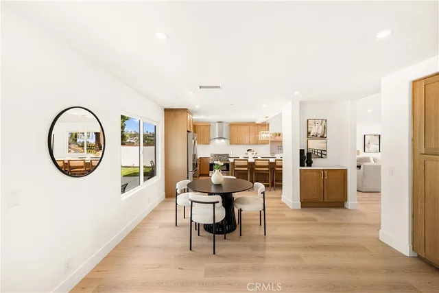 a living room with furniture fireplace and window