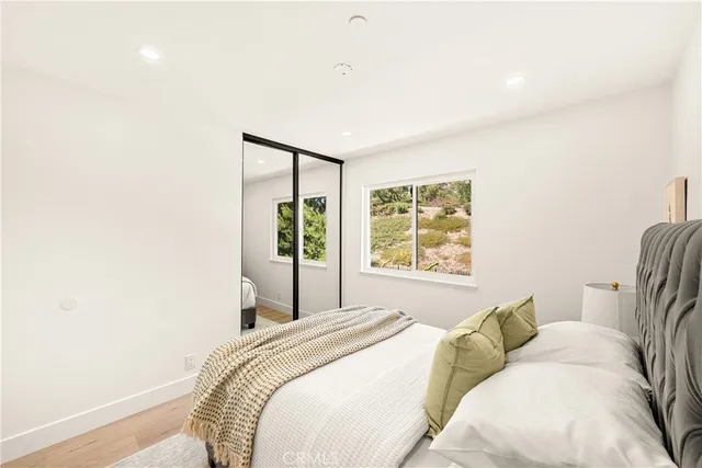 a front view of house with yard and outdoor seating