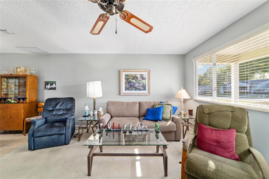 10921 Southwest 86th Court Ocala, FL 34481 - Photo 32 of 51 a living room with furniture