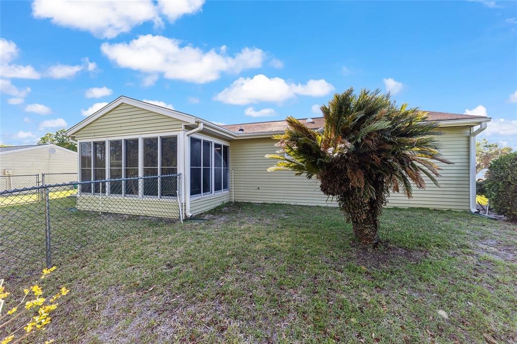 10921 Southwest 86th Court Ocala, FL 34481 - Photo 43 of 51 a view of a house with a yard