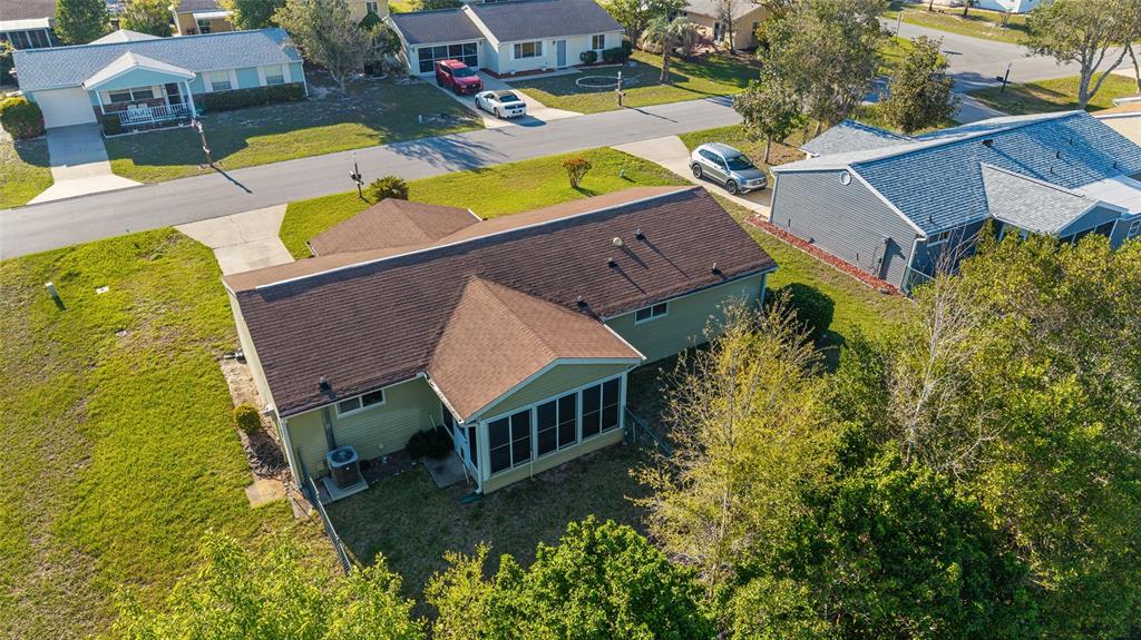 10921 Southwest 86th Court Ocala, FL 34481 - Photo 5 of 51 an aerial view of a house with a swimming pool