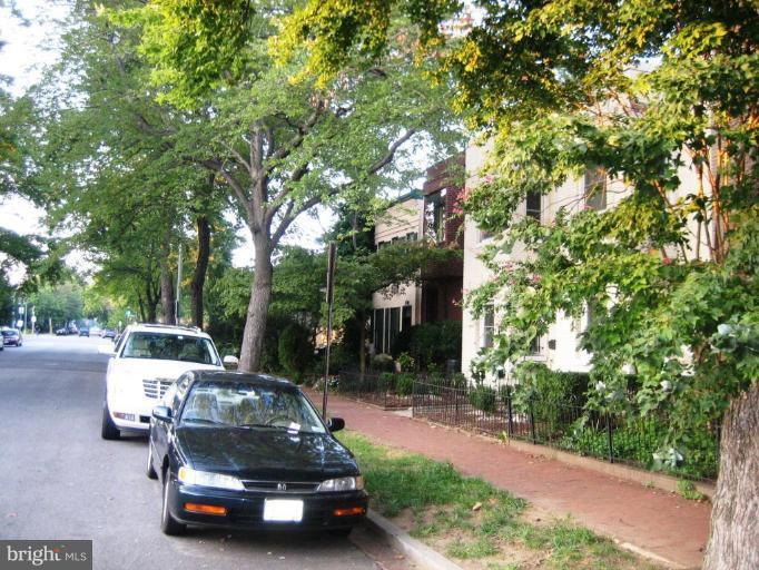 220 13th Street Southeast, Unit 5 Washington, DC 20003 - Photo 13 of 17 a car parked in front of a white house