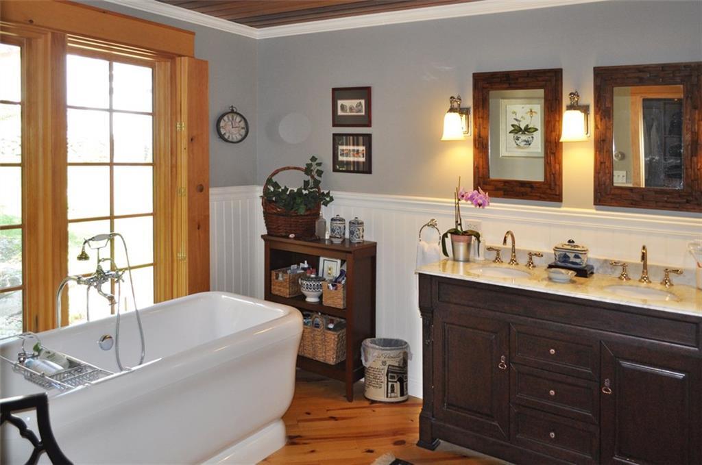 348 Heath Road Bremen, ME 04551 - Photo 16 of 32 Master bathroom with dual sinks and...