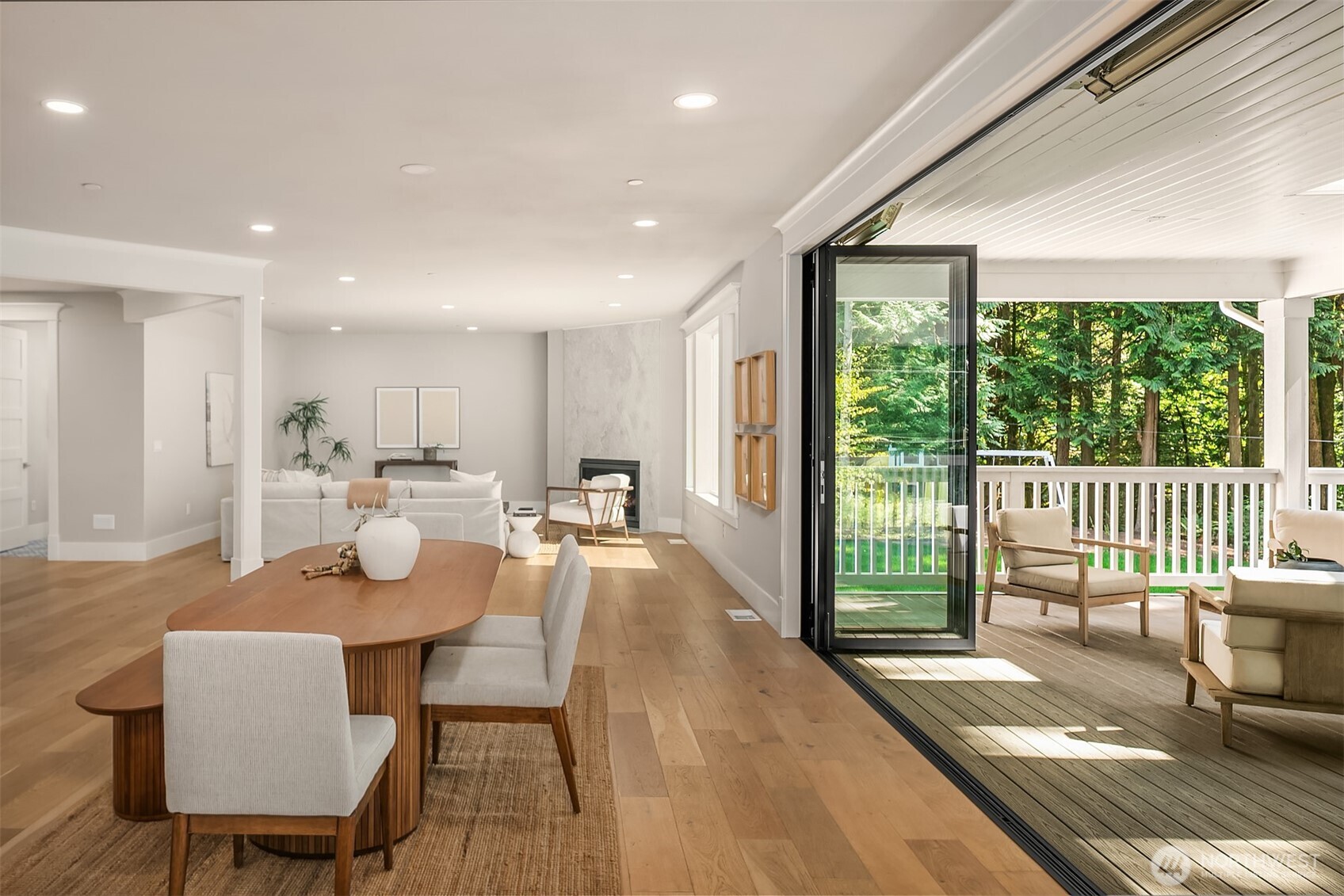 23403 Northeast Union Hill Road Redmond, WA 98053 - Photo 12 of 37 a dining room with furniture a chandelier and wooden floor