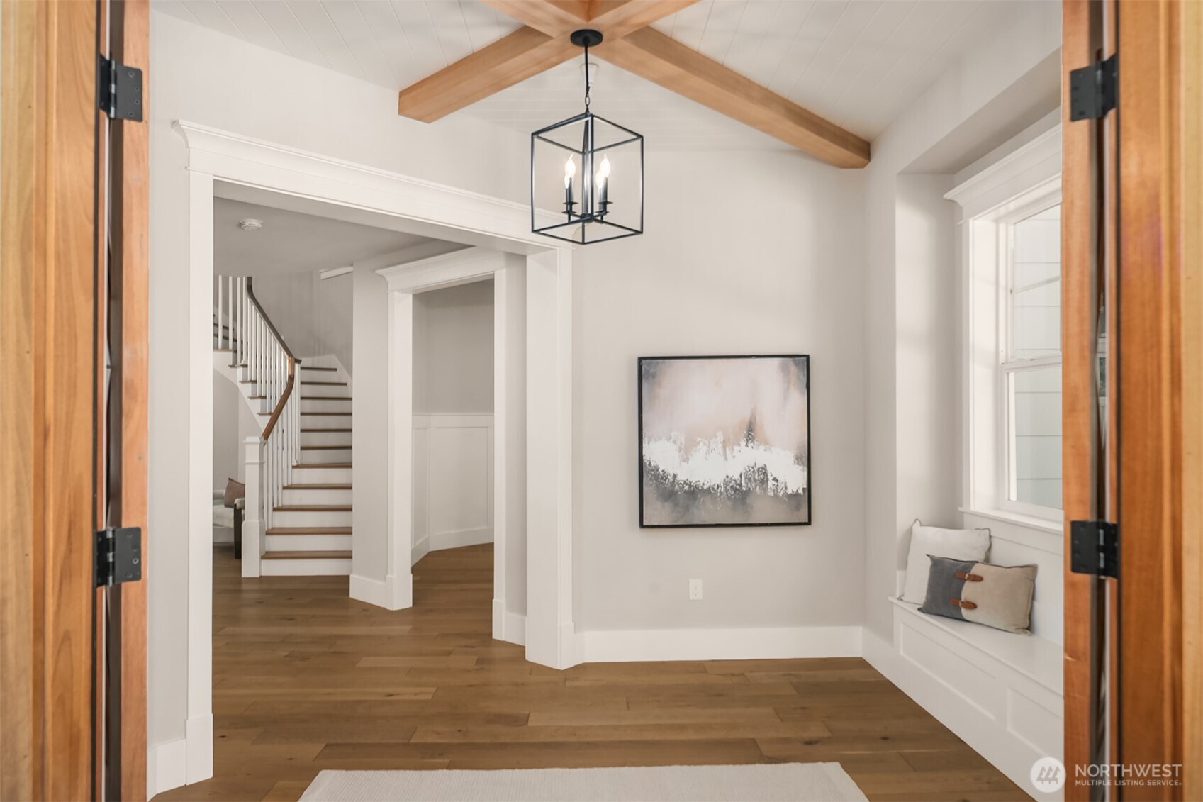 23403 Northeast Union Hill Road Redmond, WA 98053 - Photo 2 of 37 a view of a hallway with wooden floor and staircase