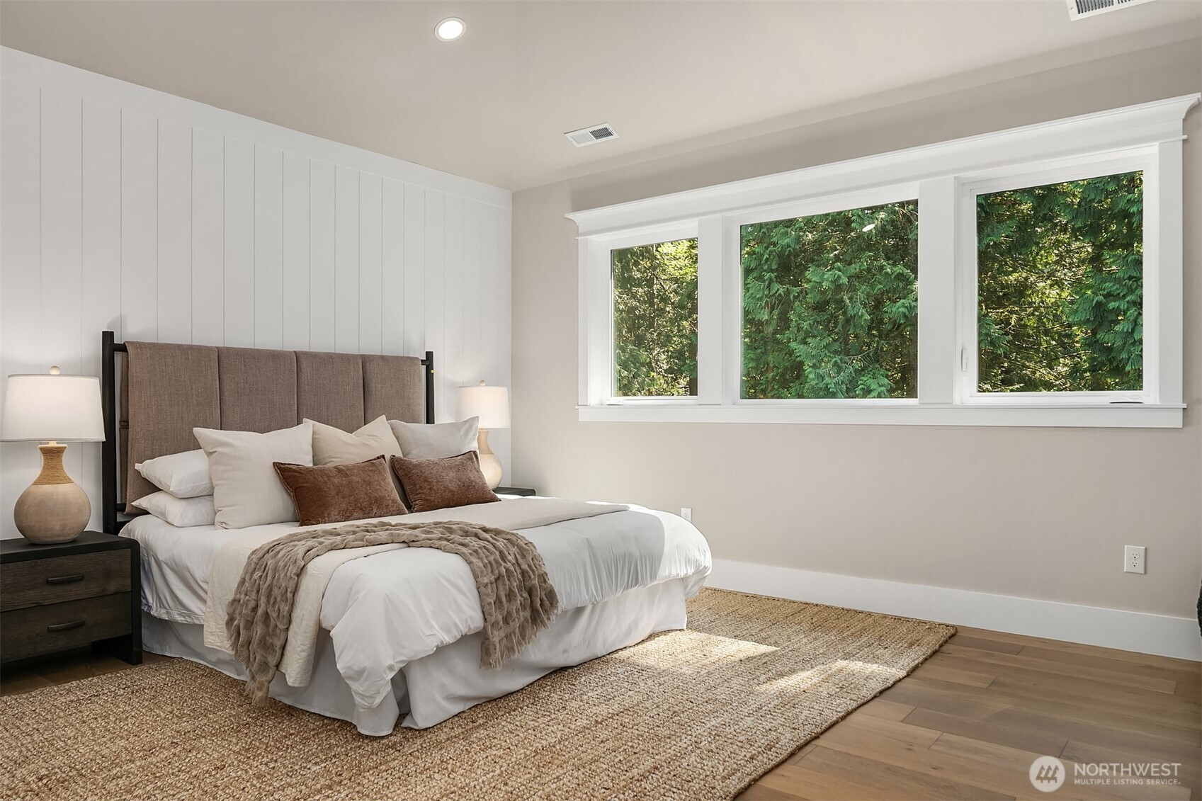 23403 Northeast Union Hill Road Redmond, WA 98053 - Photo 23 of 37 a bedroom with a bed and a large window