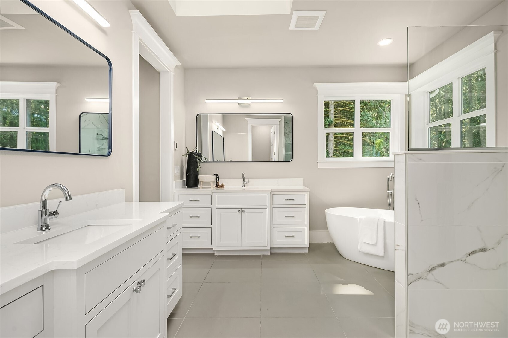23403 Northeast Union Hill Road Redmond, WA 98053 - Photo 26 of 37 a bathroom with a sink double vanity and a mirror