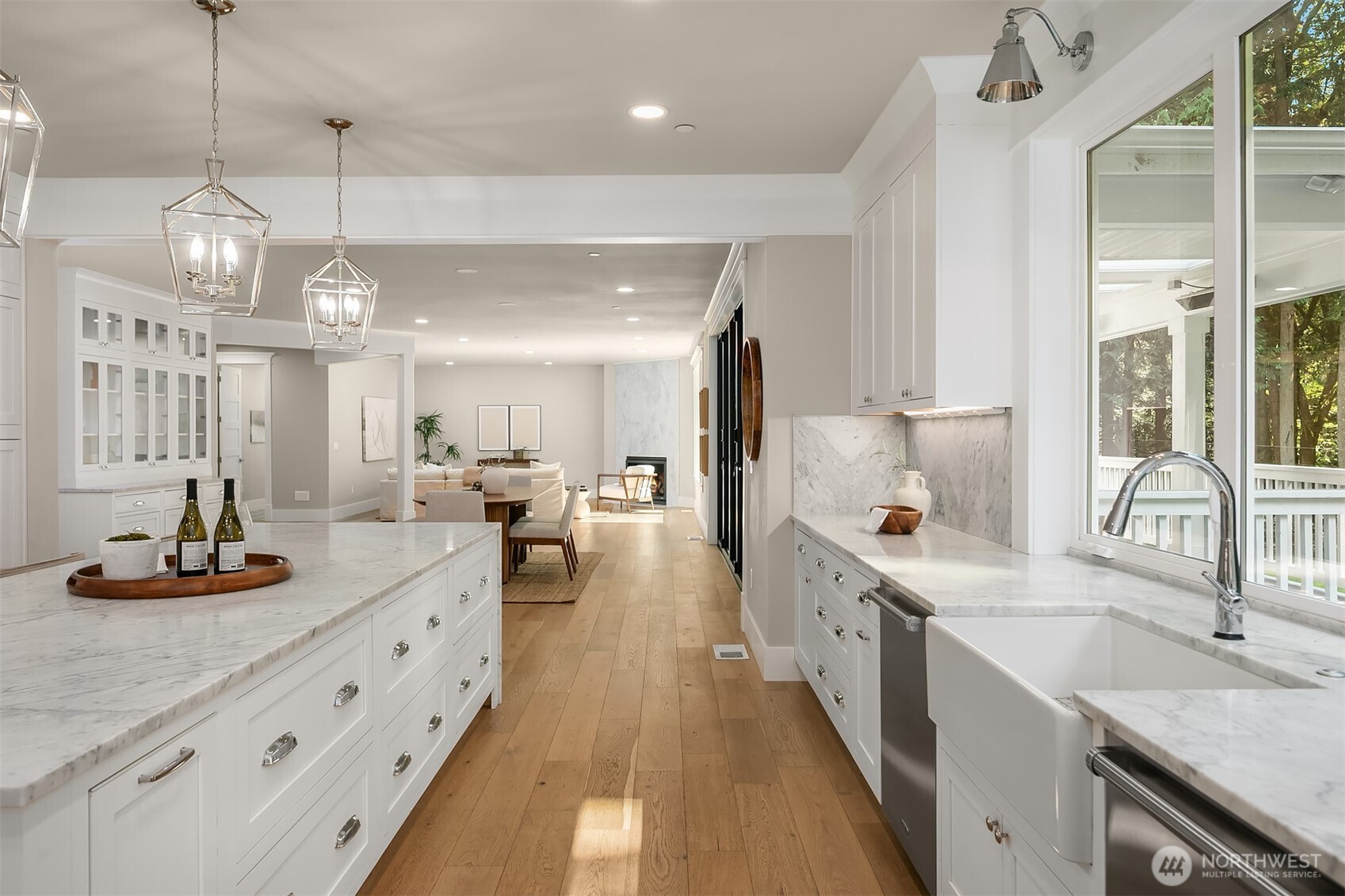 23403 Northeast Union Hill Road Redmond, WA 98053 - Photo 10 of 37 a kitchen with kitchen island granite countertop a sink a counter top space appliances and cabinets