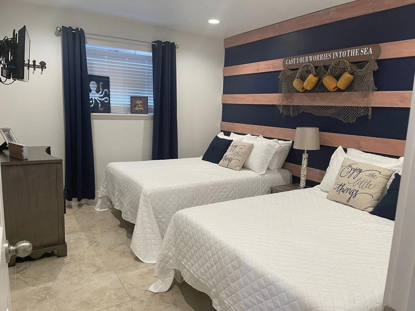 159 Sunset Bay, Unit 23A Miramar Beach, FL 32550 - Photo 15 of 31 a bedroom with double bed and two windows