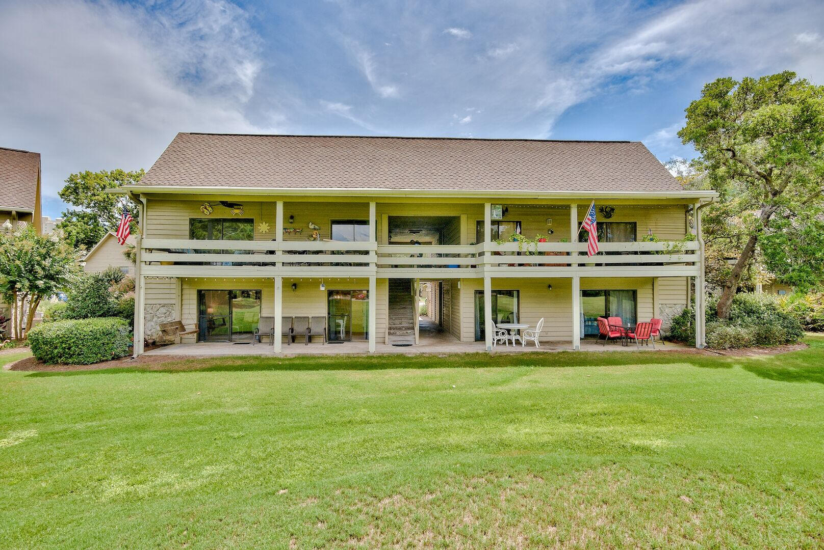 159 Sunset Bay, Unit 23A Miramar Beach, FL 32550 - Photo 24 of 31 a front view of a house with a yard