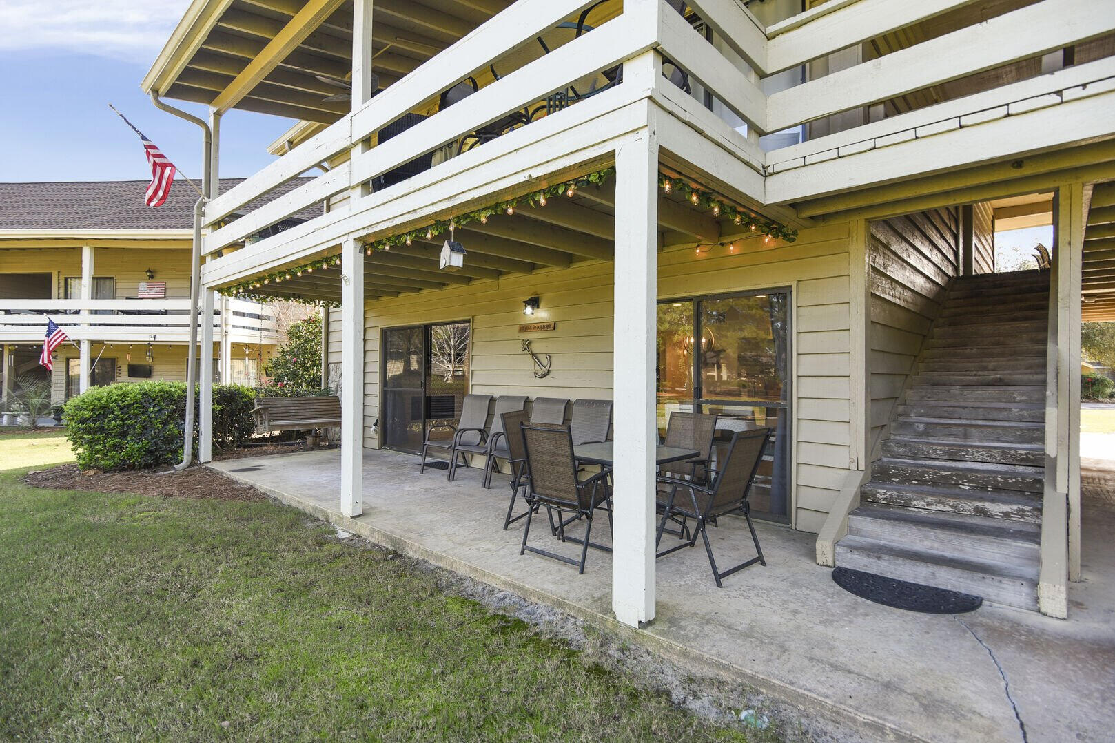 159 Sunset Bay, Unit 23A Miramar Beach, FL 32550 - Photo 29 of 31 a view of house with wooden floor and chair