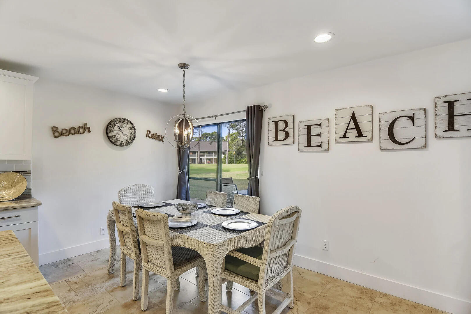 159 Sunset Bay, Unit 23A Miramar Beach, FL 32550 - Photo 7 of 31 a view of a dining room with furniture and window