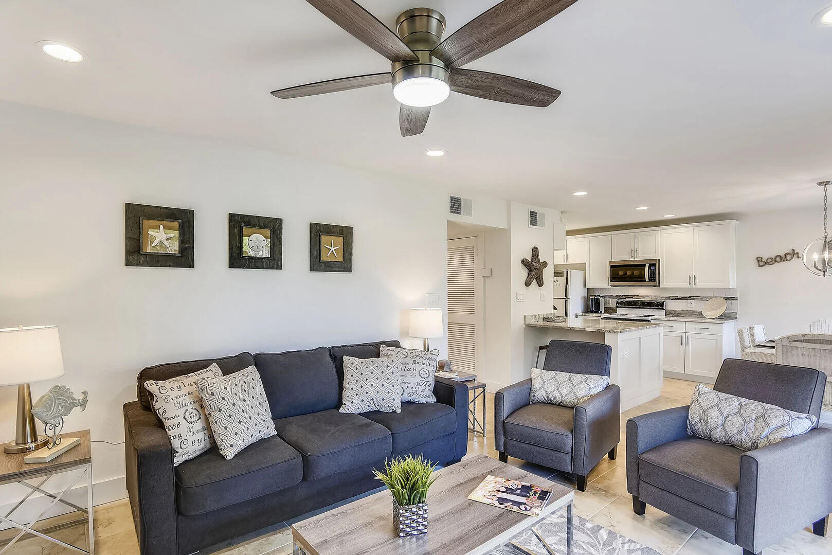159 Sunset Bay, Unit 23A Miramar Beach, FL 32550 - Photo 10 of 31 a living room with furniture kitchen view and a window