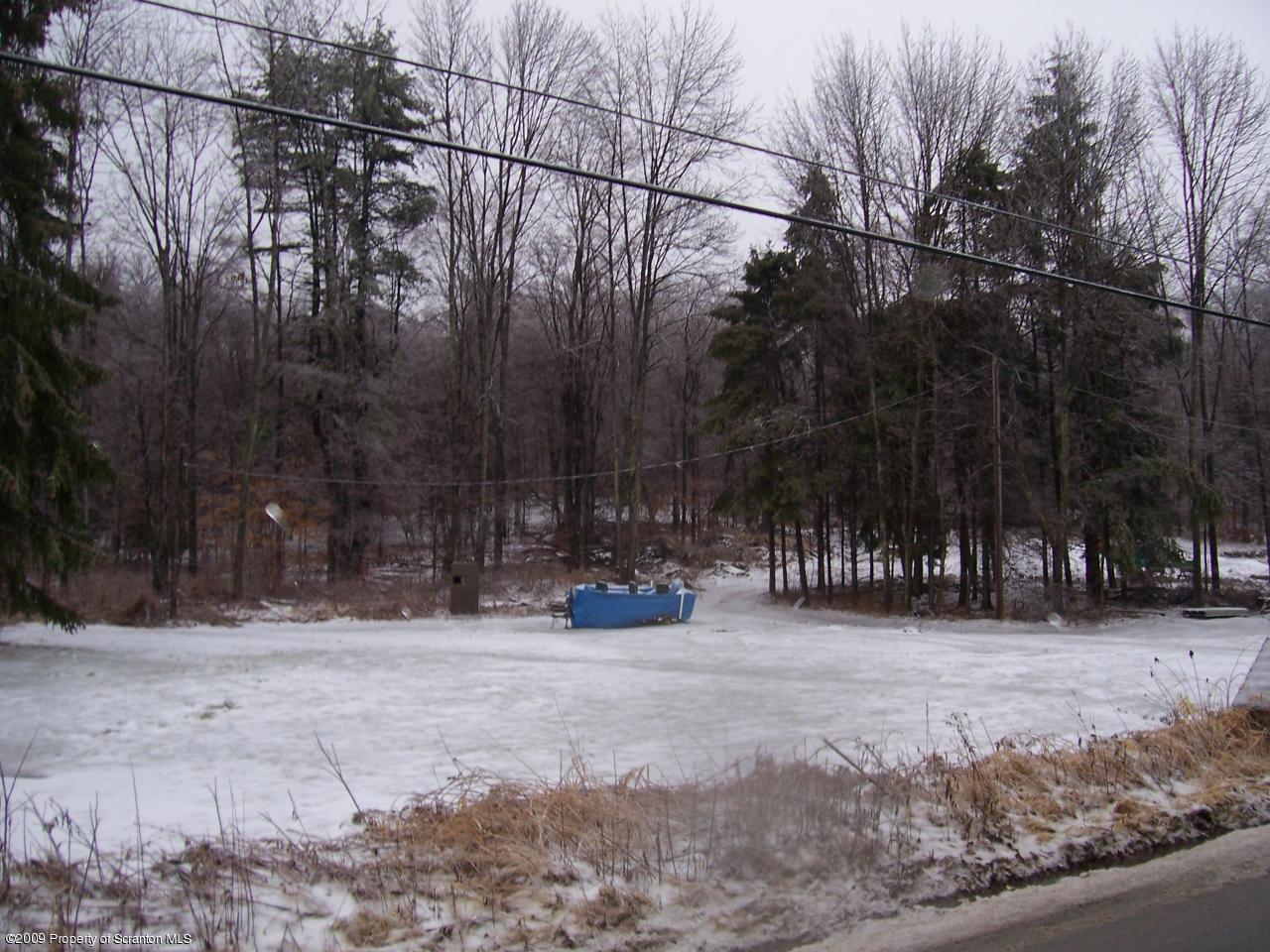 6456 R R, Unit 6 Montrose, PA 18801 - Photo 4 of 10 a view of a park with a snow on the road