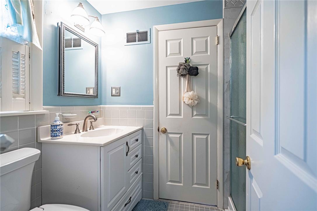 285 Bridle Path Road Bethlehem, PA 18017 - Photo 28 of 54 a bathroom with a sink mirror and a toilet