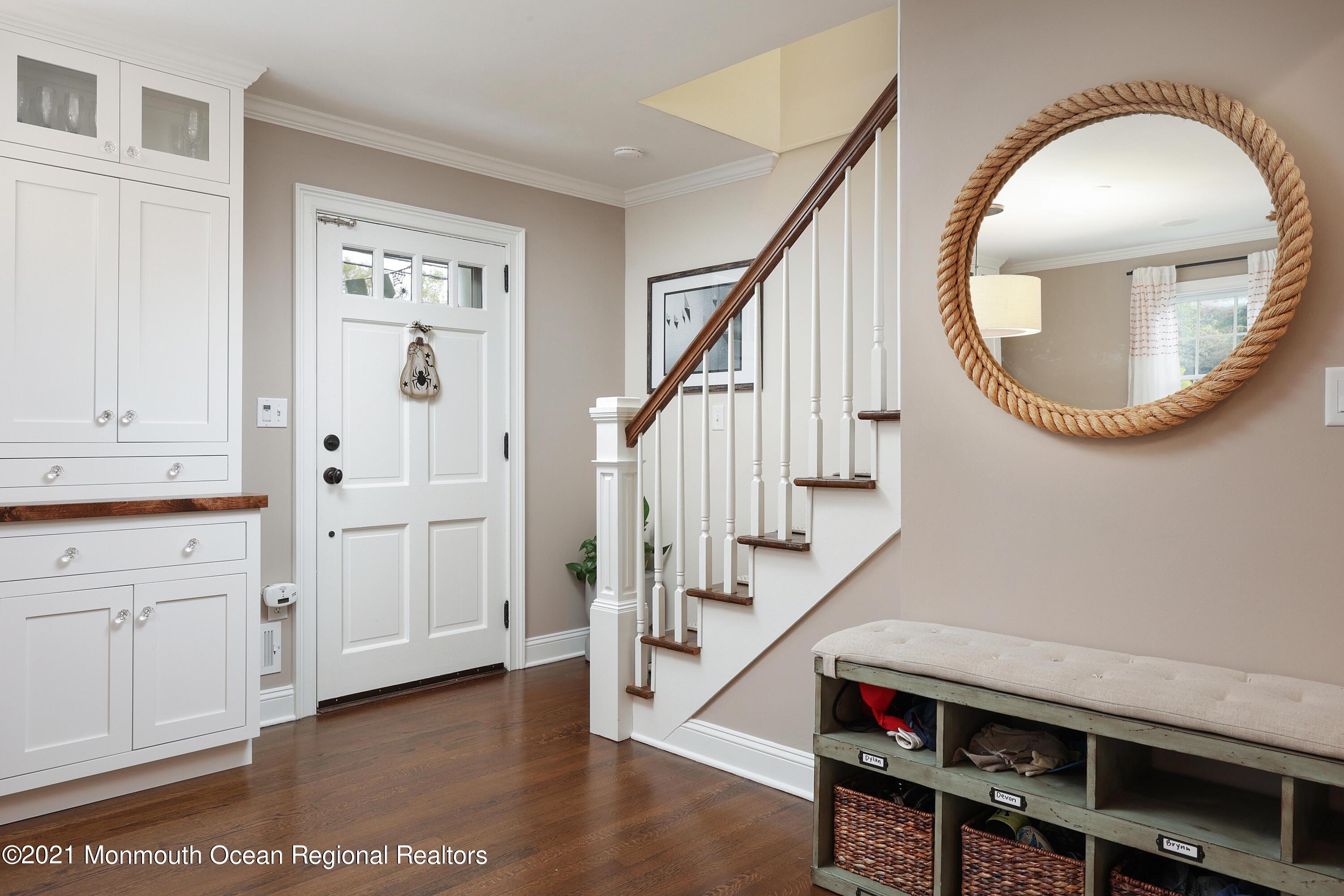 57 River Road Rumson, NJ 07760 - Photo 3 of 34 a view of an entryway with wooden floor