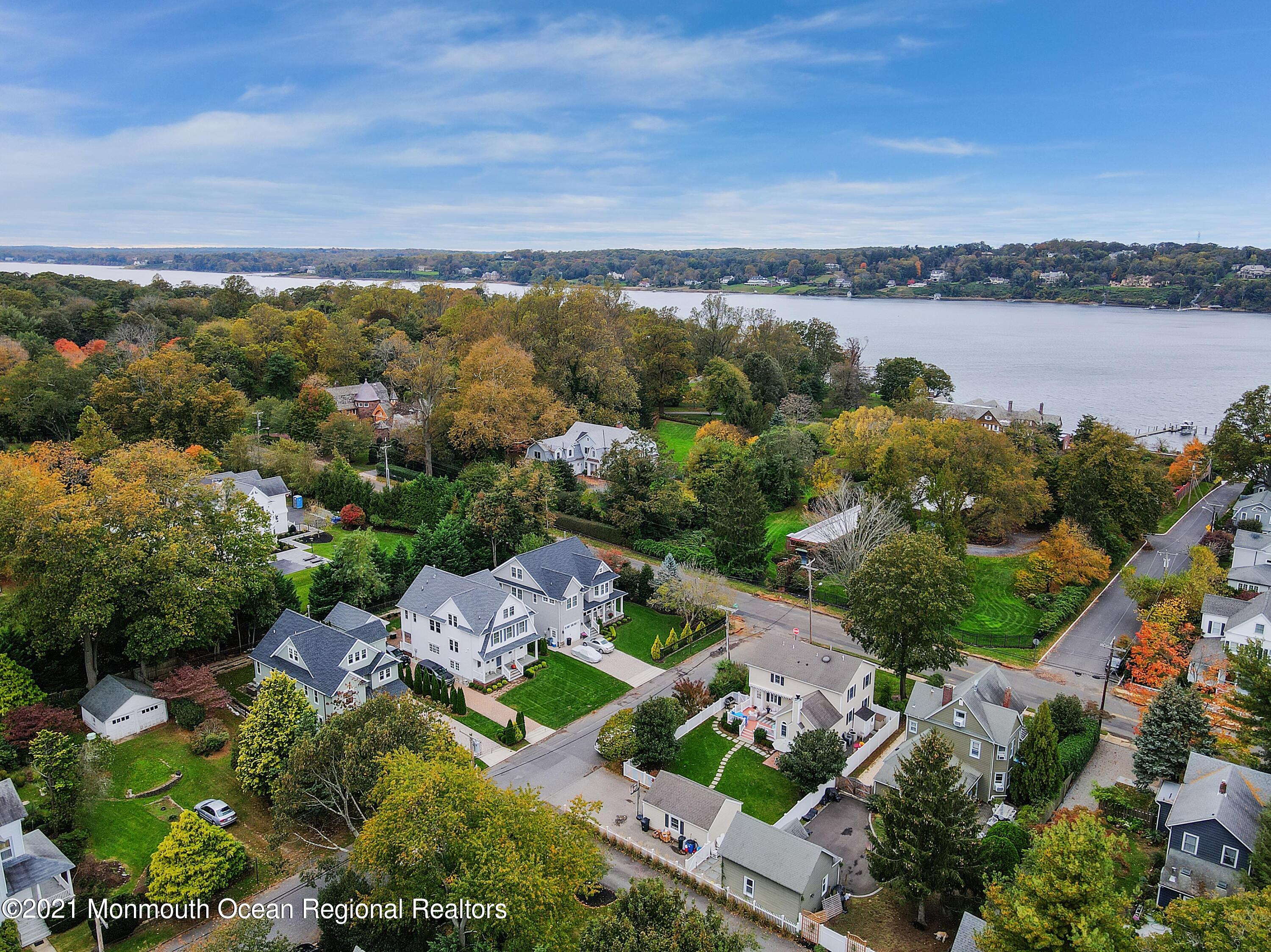 57 River Road Rumson, NJ 07760 - Photo 31 of 34 an aerial view of a city and lake view