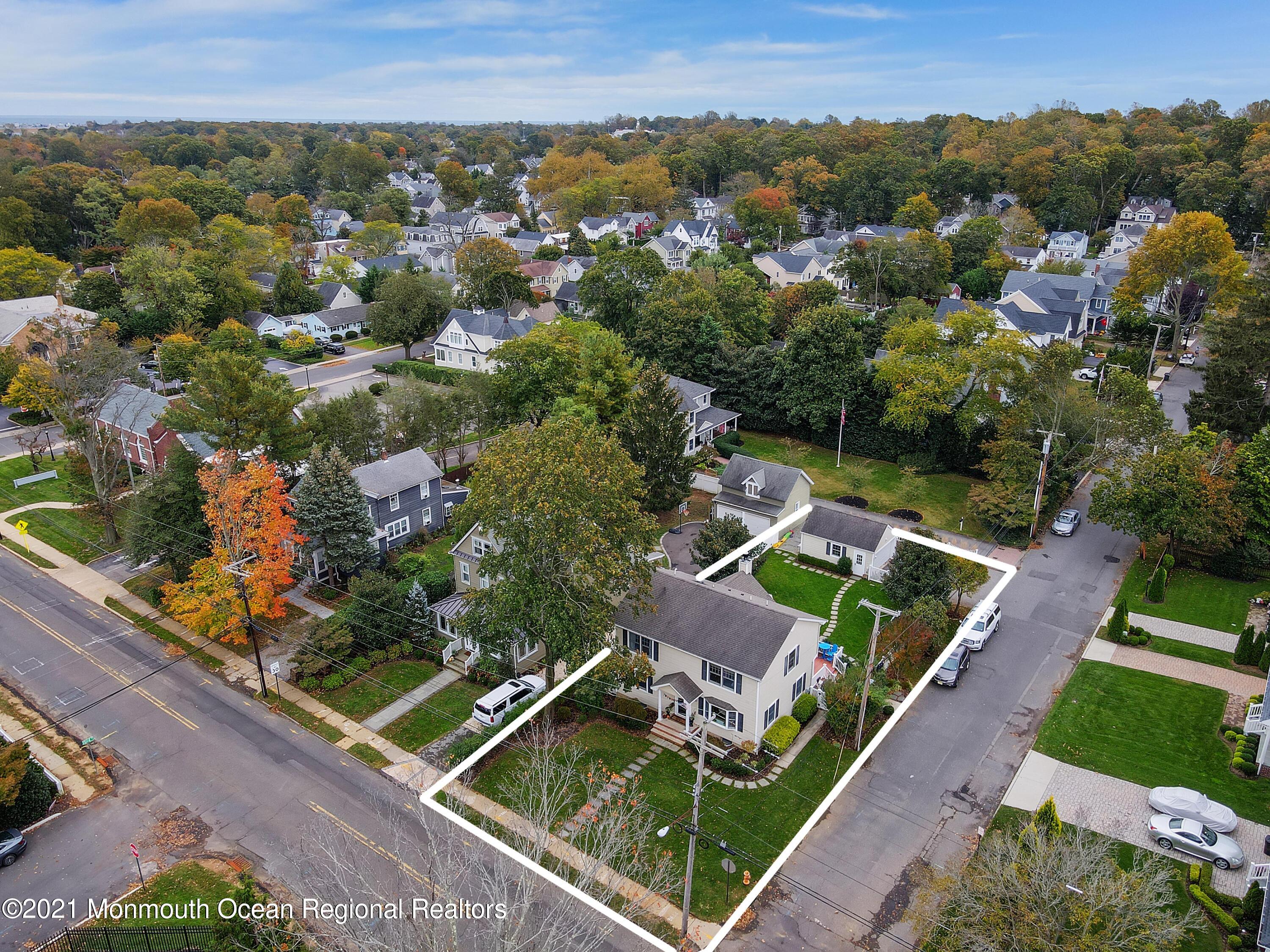 57 River Road Rumson, NJ 07760 - Photo 32 of 34 an aerial view of a house with a garden