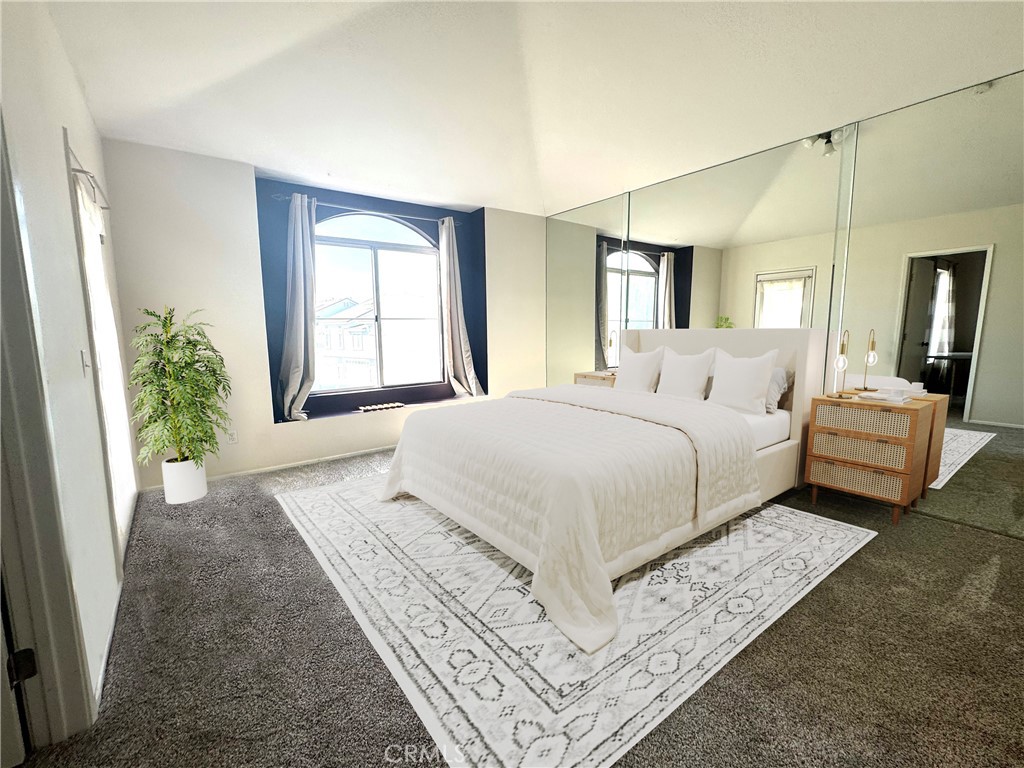 2275 Indigo Hills Drive, Unit 4 Corona, CA 92879 - Photo 5 of 9 a bedroom with a large bed and a window