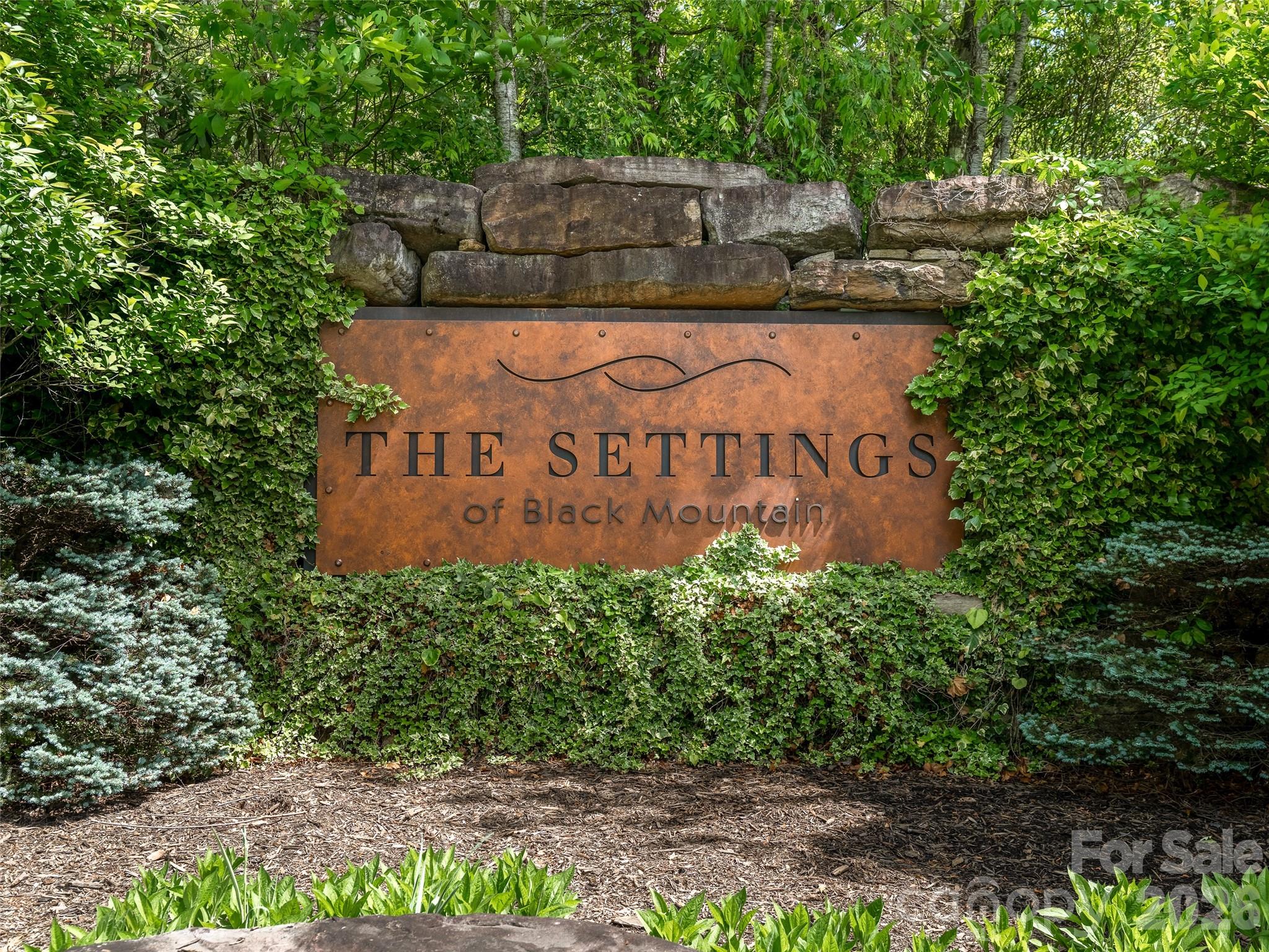 11 Crockett Ridge Road Black Mountain, NC 28711 - Photo 15 of 19 a sign on the side of the road