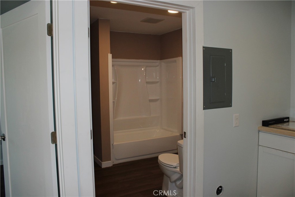 5776 Katherine Street Simi Valley, CA 93063 - Photo 11 of 15 a bathroom with a toilet and a shower
