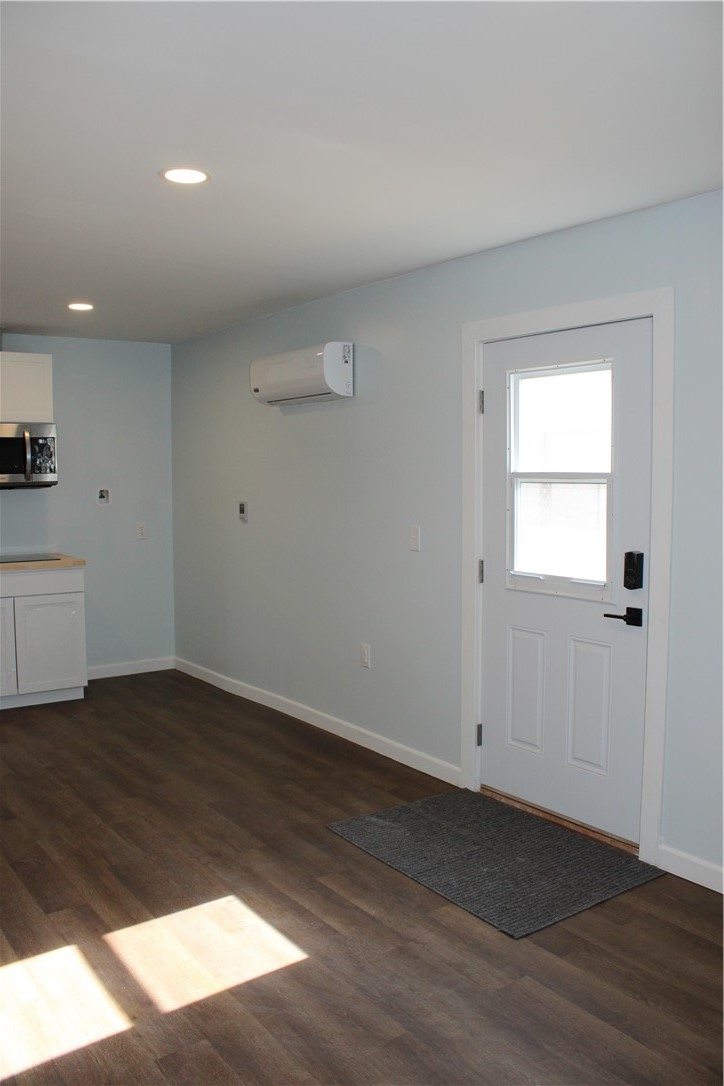 5776 Katherine Street Simi Valley, CA 93063 - Photo 5 of 15 an empty room with wooden floor and windows