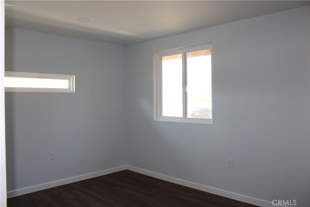 5776 Katherine Street Simi Valley, CA 93063 - Photo 9 of 15 a view of a small space with wooden floor and a window