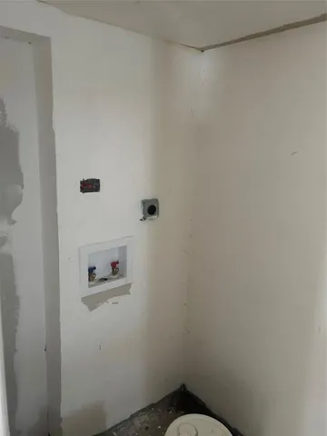 a bath room with a toilet