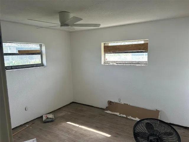 a bathroom with a toilet and shower