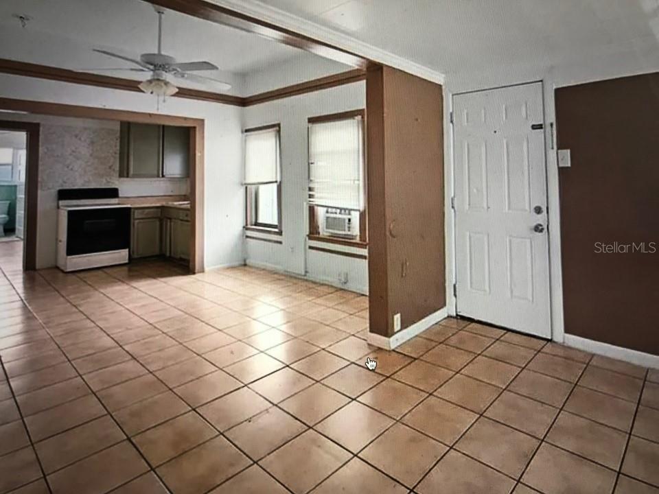 941 Lakeview Road Clearwater, FL 33756 - Photo 11 of 20 a view of a kitchen with a sink and a refrigerator