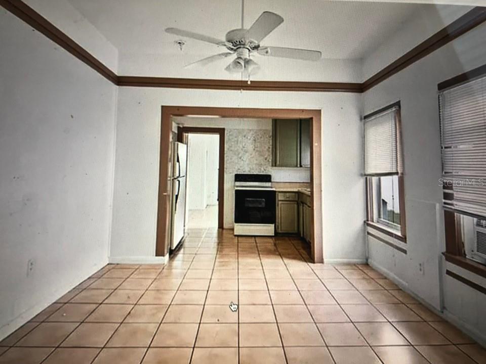 941 Lakeview Road Clearwater, FL 33756 - Photo 19 of 20 a view of a hallway with a kitchen