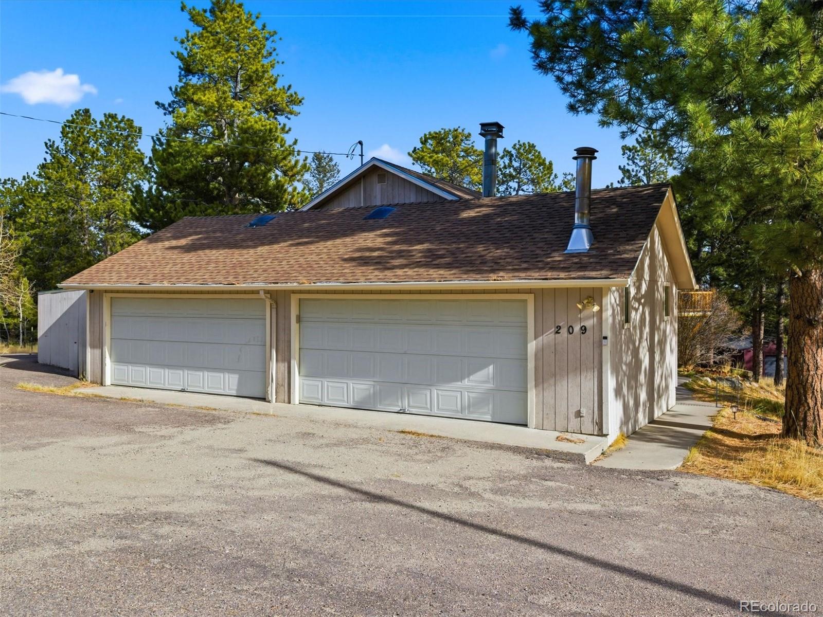209 Pine Drive Bailey, CO 80421 - Photo 35 of 48 front view of a house