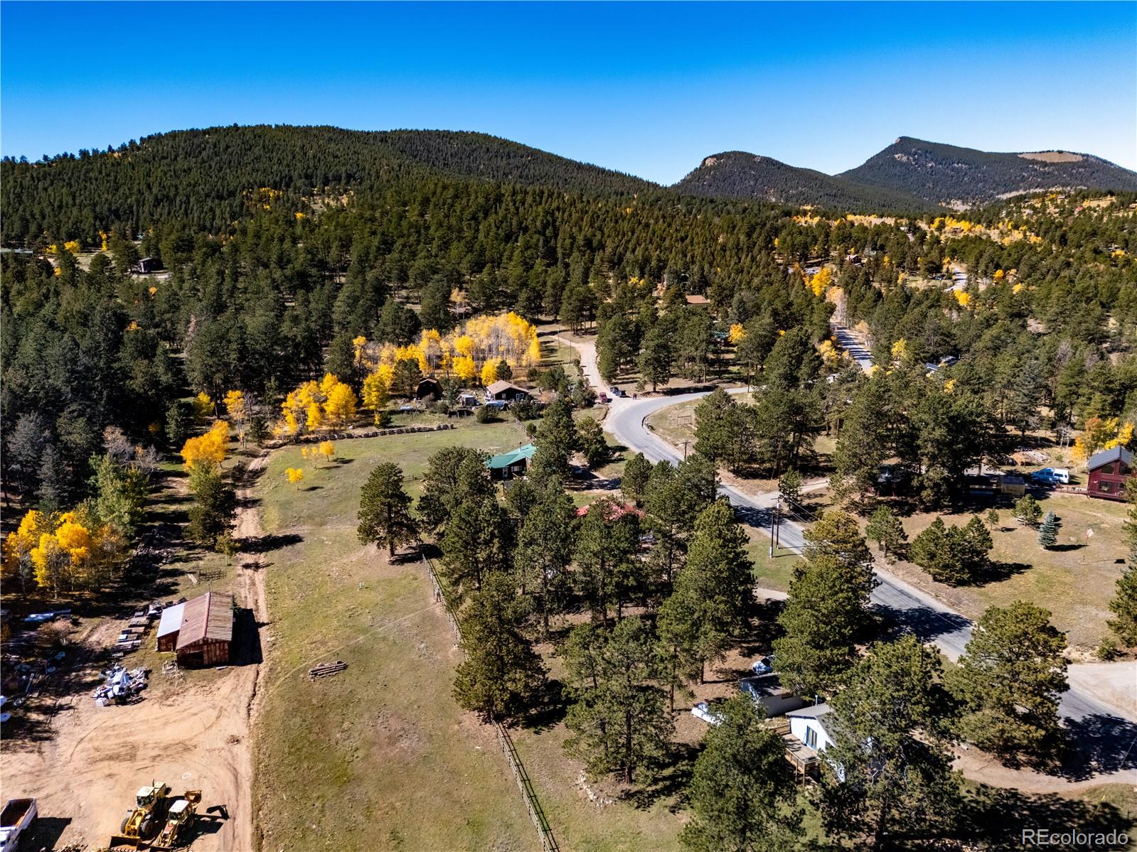 209 Pine Drive Bailey, CO 80421 - Photo 43 of 48 a view of a town with mountains in the background
